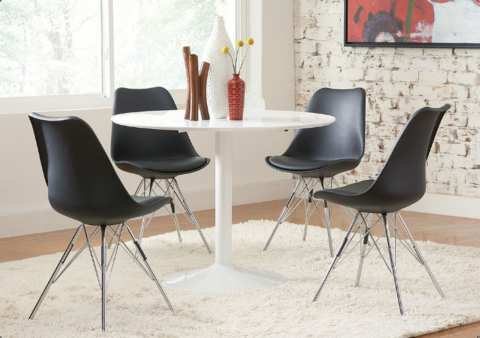 white dining table with black chairs